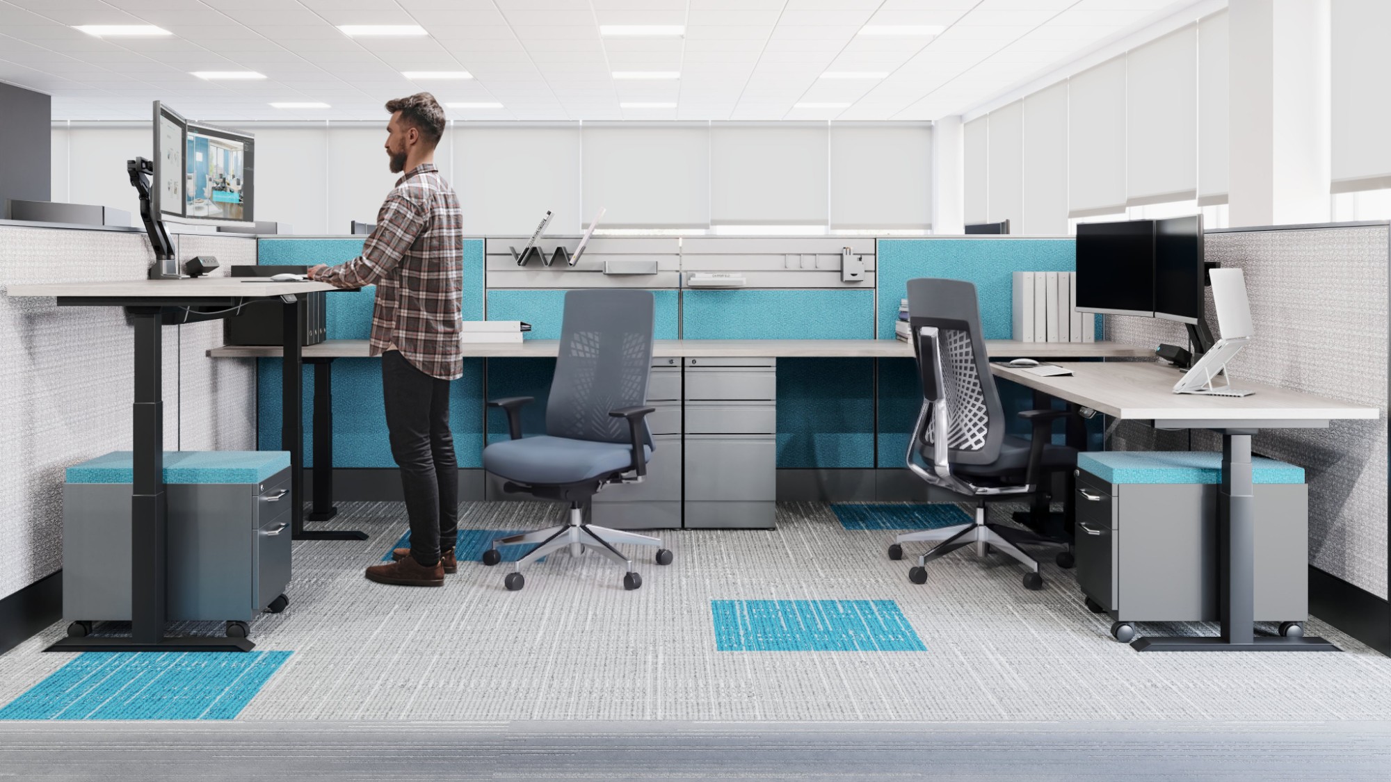A benching workstation with a sit-stand surface and monitor arms